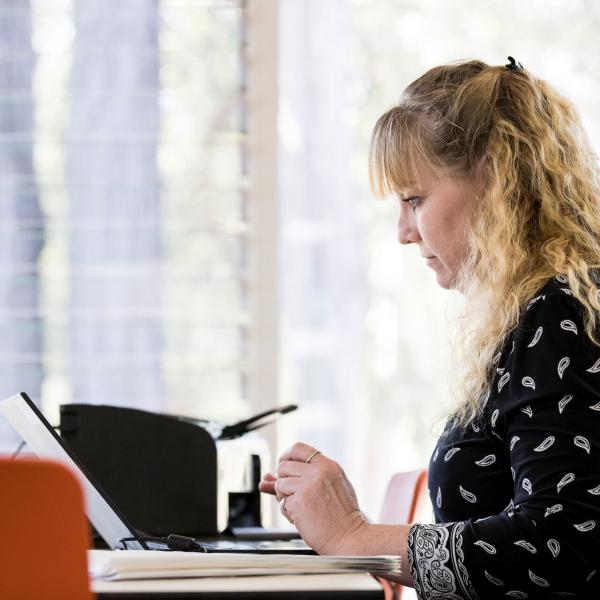 Resident using a laptop