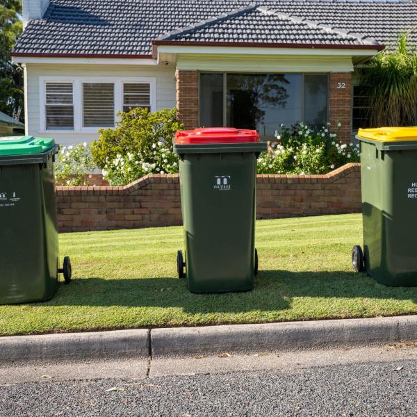 Green, red and yellow bins