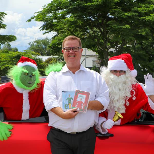 Mayor Philip Penfold with the Grinch and Santa