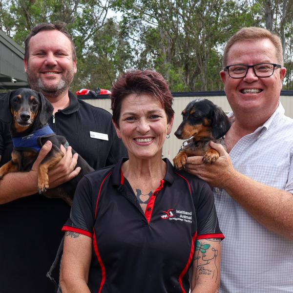 Maitland and Cessnock Mayors Philip Penfold and Daniel Watton with Maitland Animal Management Facility staff member Dee Walton