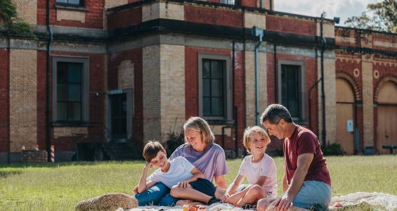 Family having a picnic in the grounds of Walka