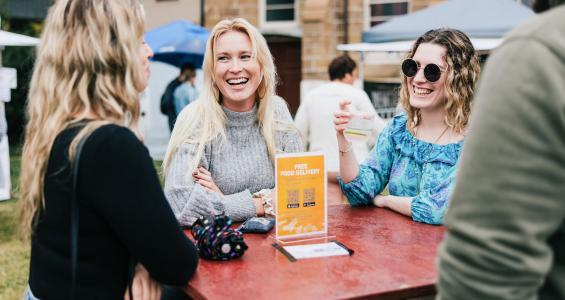 Three girls enjoying Maitland Taste Festival