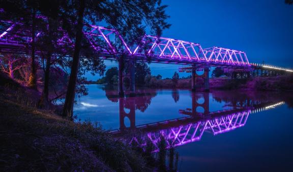 Morpeth Bridge lit purple