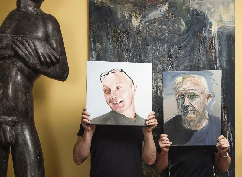 Image caption: Benefactors Gordon Elliott and Michael Eyes, holding works artists Euan Macleod (Gordon) and Juan Ford (Michael), both oils on board. Photographer Christoper Pearce