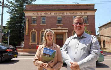Manager City Experiences and Economy Caroline Booth with Maitland Mayor Philip Penfold outside the former Maitland Mercury building on Maitland's High Street.jpg