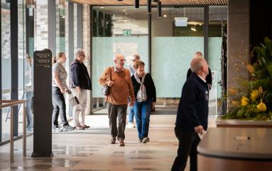 Couple walking into the entrance of Maitland Administration Centre