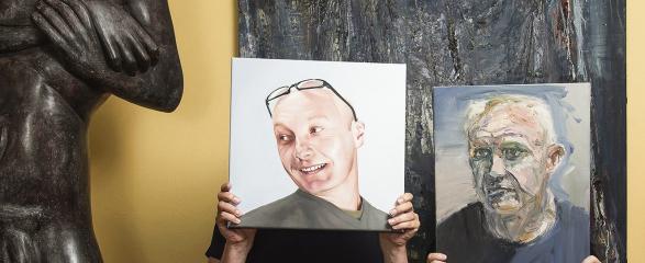 Image caption: Benefactors Gordon Elliott and Michael Eyes, holding works artists Euan Macleod (Gordon) and Juan Ford (Michael), both oils on board. Photographer Christoper Pearce