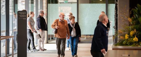 Couple walking into the entrance of Maitland Administration Centre