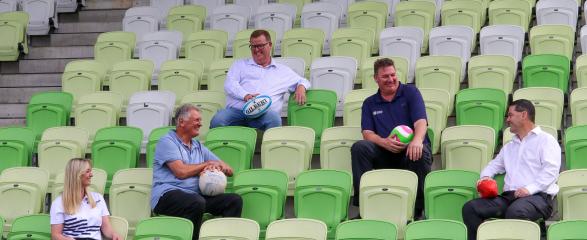 Hunter Academy of Sport team sitting with Mayor and Maitland Council General Manager sitting in the stands at Maitland Sportsground