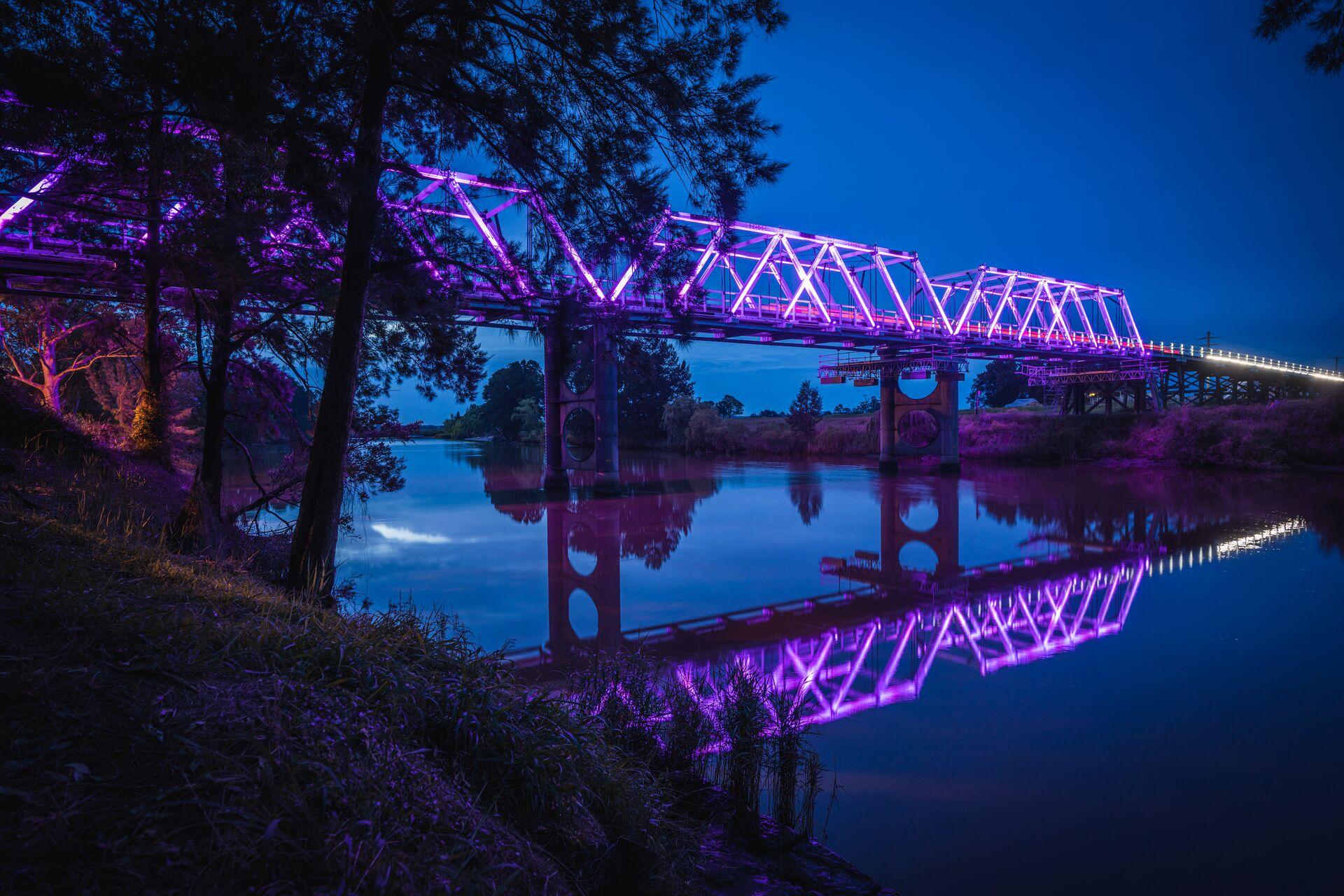 Morpeth Bridge lit purple