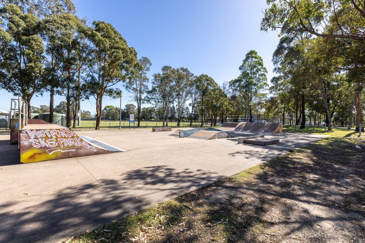 Concrete skatepark with mini ramp 