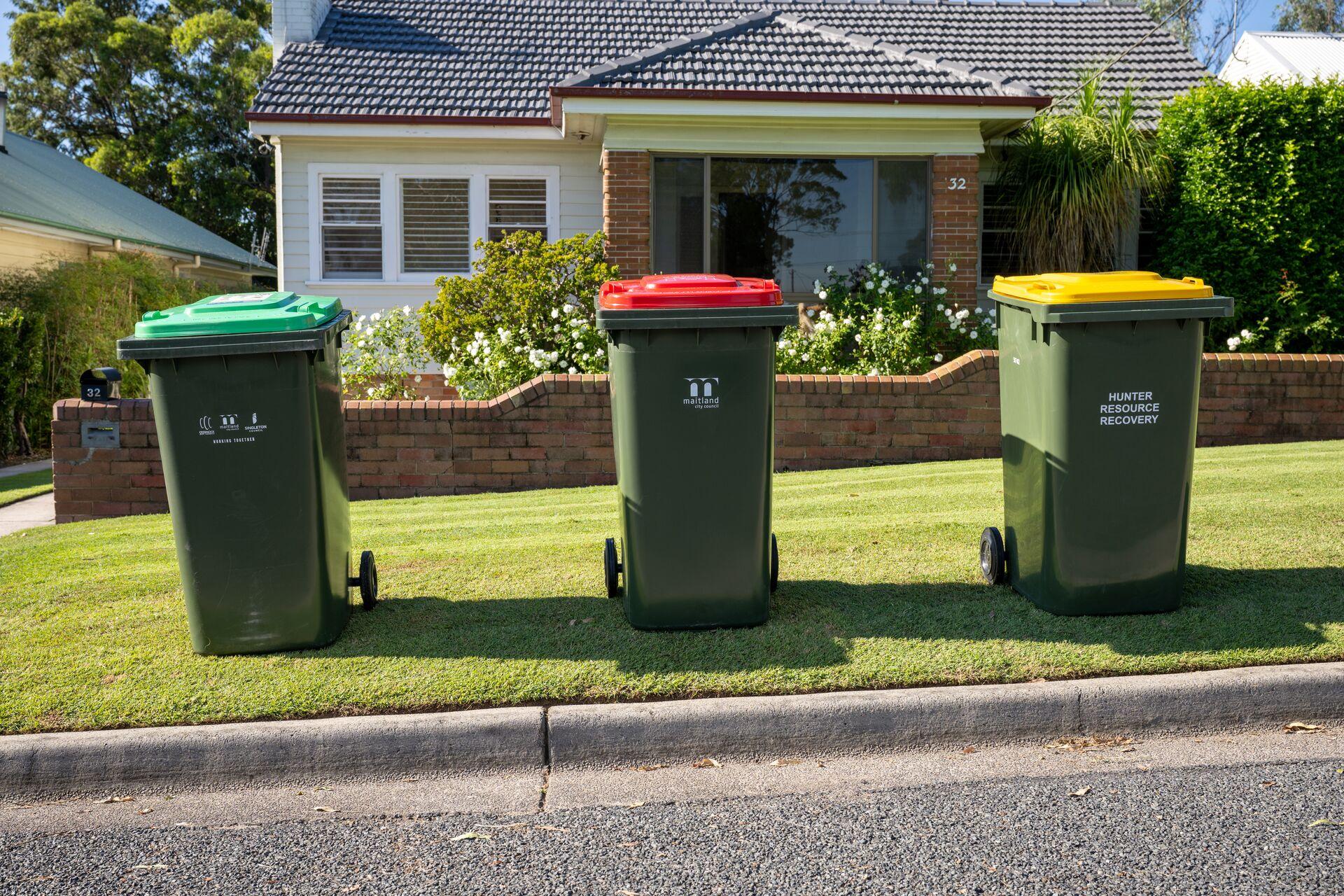Green, red and yellow bins
